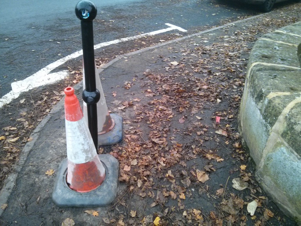 Bollard on the corner of Shakespeare avenue installed to protect children walking to school from vehicles taking the corner.