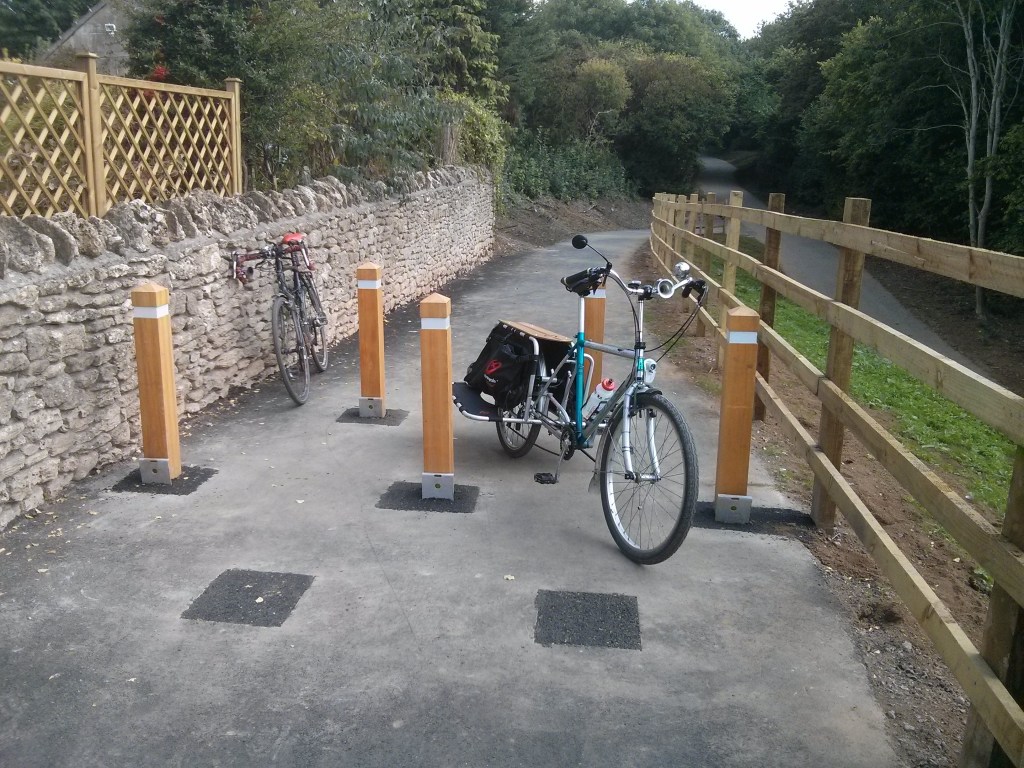 Rather large Cargo bike negotiating the 1.2m gap in the 5 bollards on the Claude Avenue Ramp.