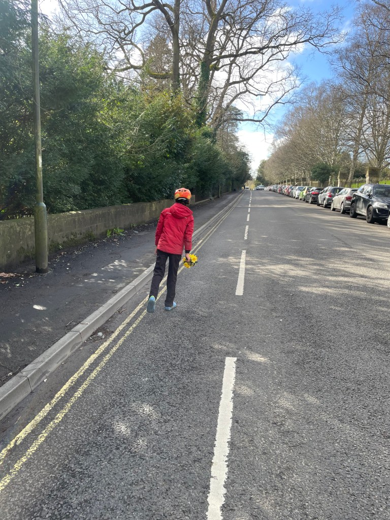 Child walking in advisory cycle lane